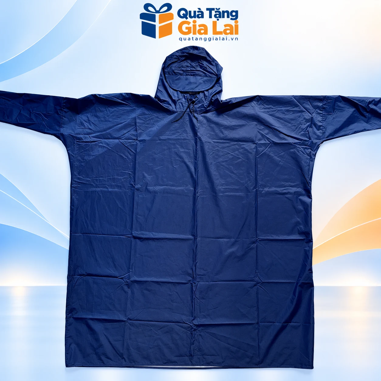 Áo mưa bít vải dù tổ ong màu xanh đậm, mũ liền có dây trên nền Quà Tặng Gia Lai