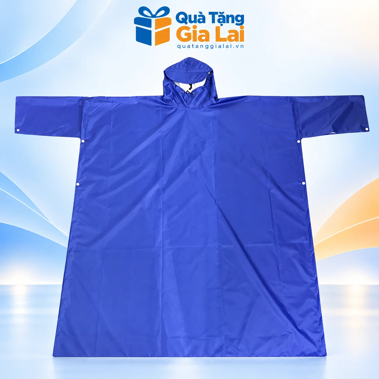 Áo mưa cài cạnh có tay vải dù vân tổ ong màu xanh trên nền Quà Tặng Gia Lai