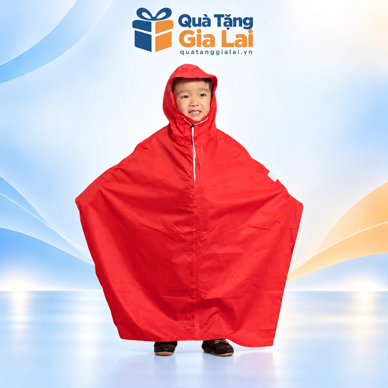 Áo mưa cánh dơi trẻ em màu đỏ với mũ liền có dây trên nền Quà Tặng Gia Lai