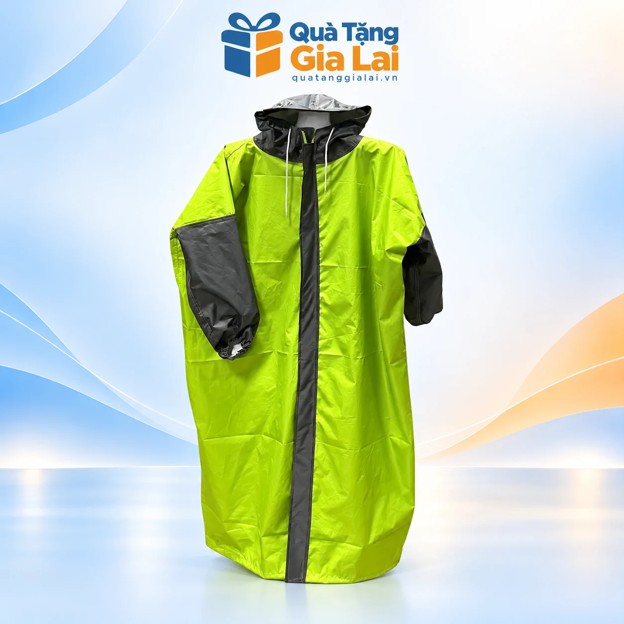 Áo mưa măng tô trẻ em xanh cốm phối xám trên nền Quà Tặng Gia Lai