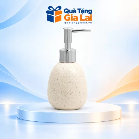 Bình dầu gội dáng trứng men sáng lấm tấm, vòi nhựa màu bạc trên nền Quà Tặng Gia Lai