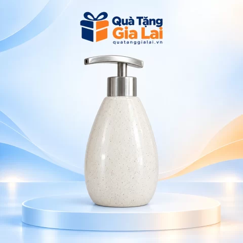Bình dầu gội dáng xoài men sáng lấm tấm, vòi inox đầu nhấn bạc trên nền Quà Tặng Gia Lai