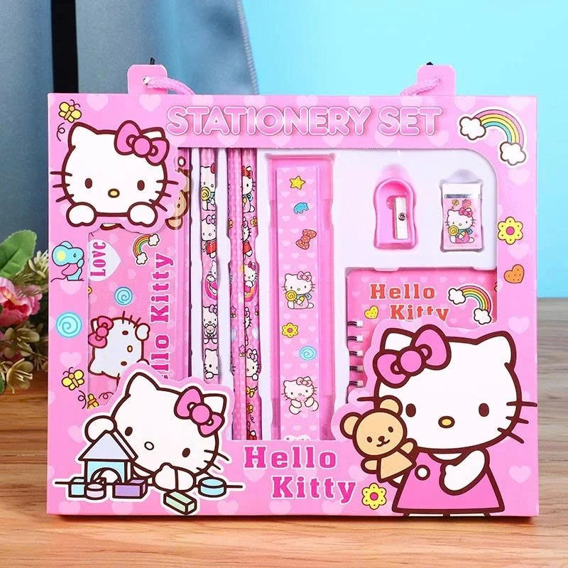 Mẫu bộ dụng cụ học tập hồng chụp trên bàn