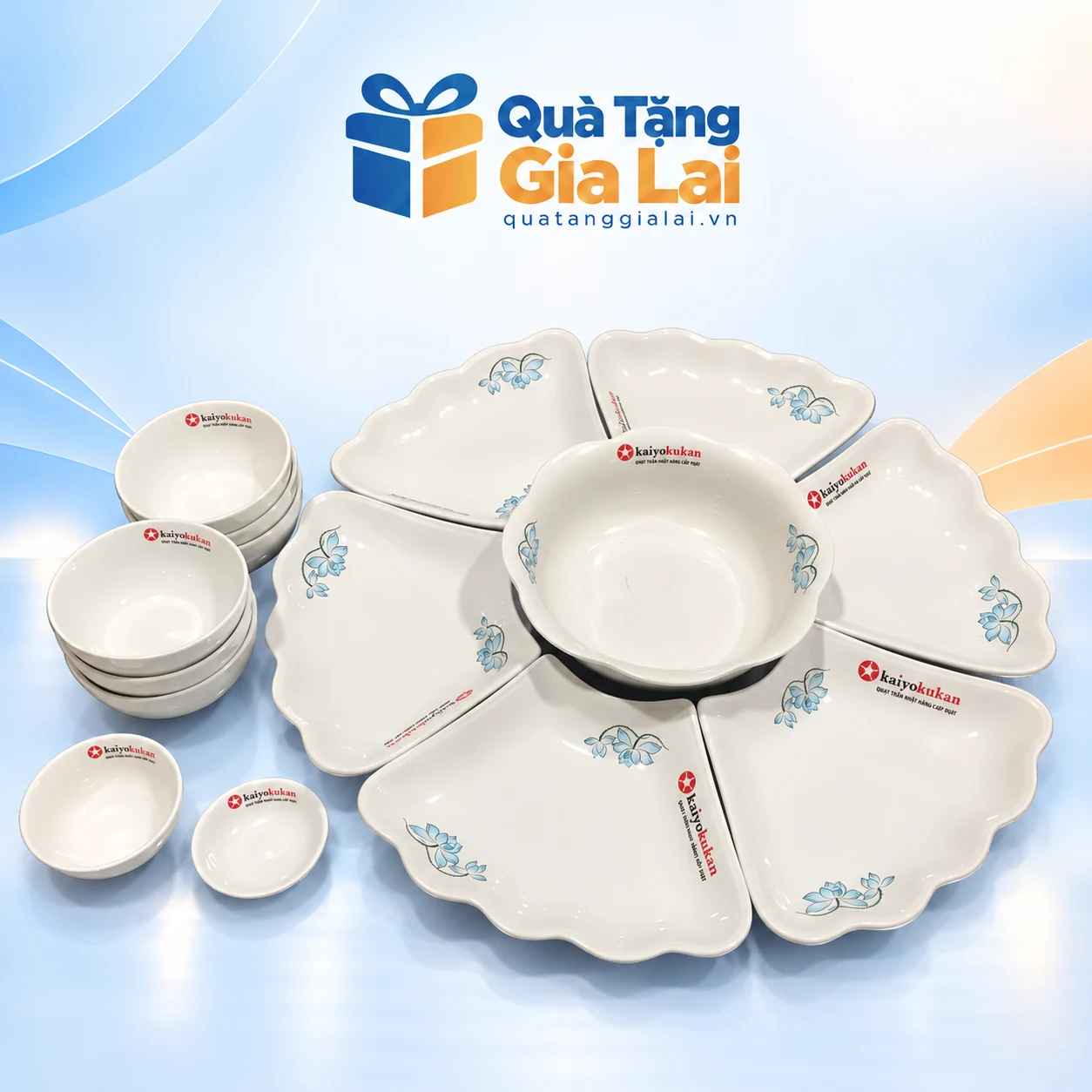 Bộ Mặt Trời Minh Châu 15 món hoa xanh cùng mẫu logo trên nền Quà Tặng Gia Lai