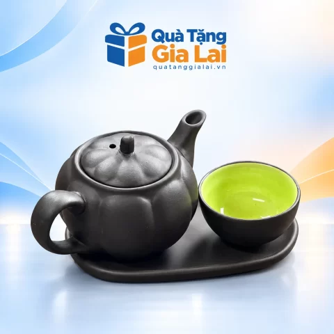 Bộ trà độc ẩm bí mini đen, chén lòng xanh trên nền Quà Tặng Gia Lai