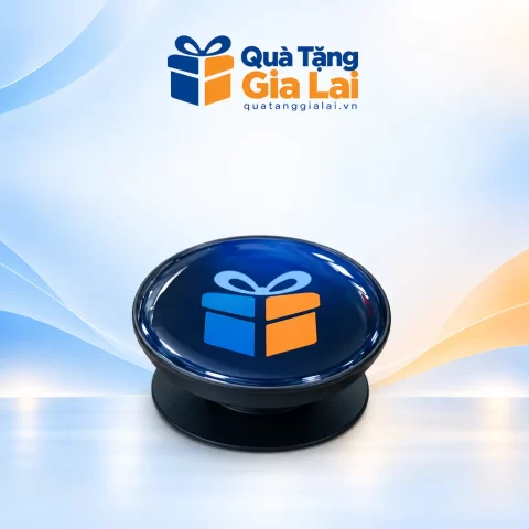 Giá đỡ điện thoại mặt tròn xanh đậm có biểu trưng xanh cam và đế đen