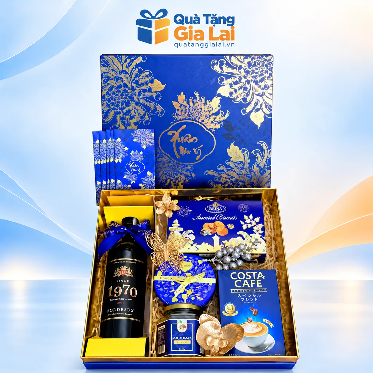 Bộ quà Tết Xuân Về 17 với năm món trong hộp xanh hoa cúc
